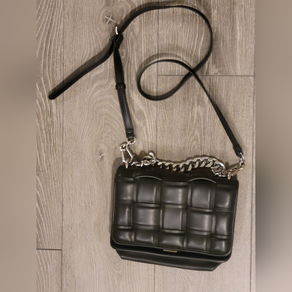 Steve Madden Bmatterd Black bag with silver chain.